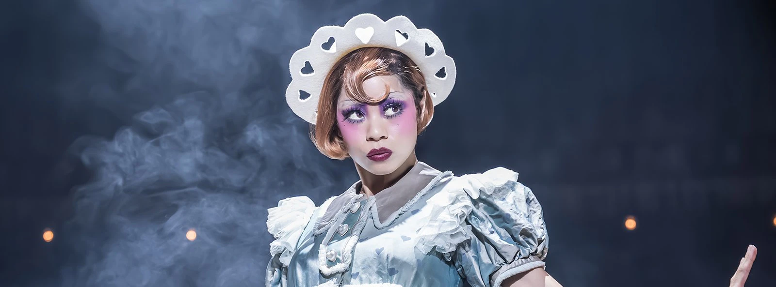 Performer in costume during Cabaret Westend show stage performance.
