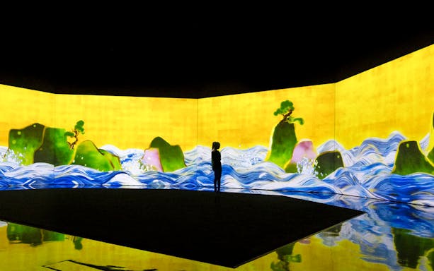 ArtScience Museum exhibit with digital waves and islands, City in A Garden theme.