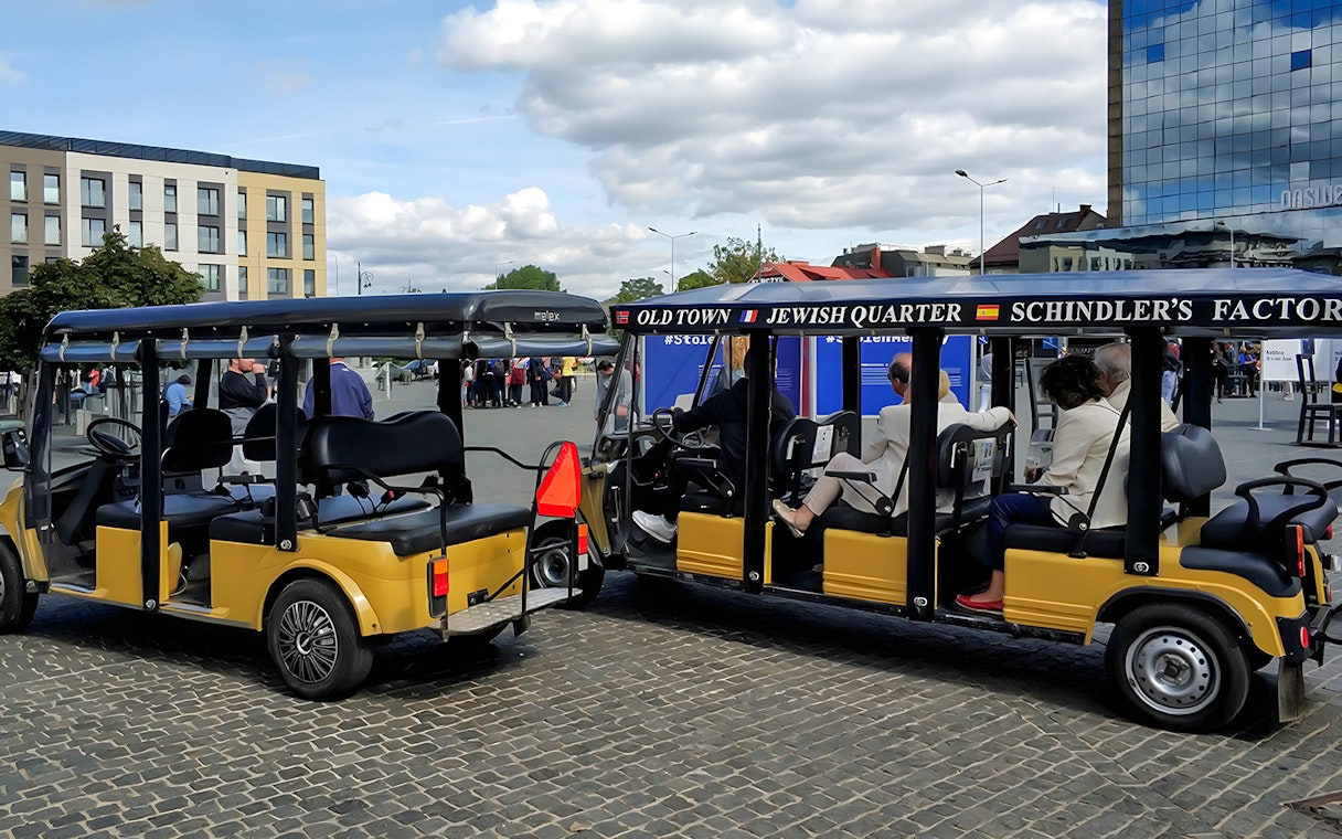 Golf cart tour in Krakow's Jewish Quarter near Schindler's Factory Museum.