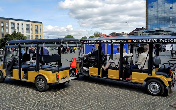 Golf cart tour in Krakow's Jewish Quarter near Schindler's Factory Museum.