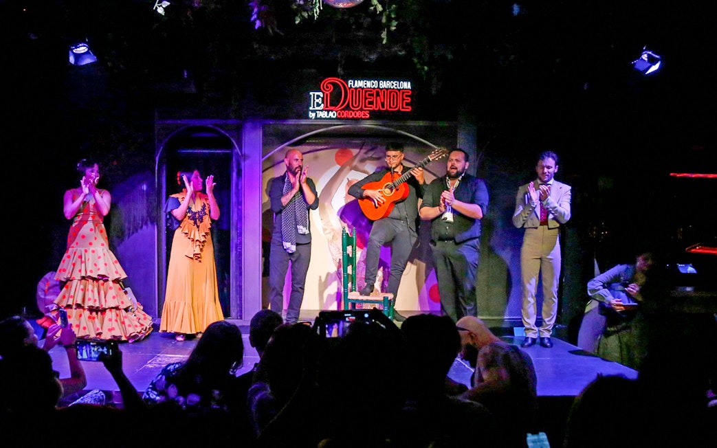 Flamenco dancers and guitarist performing at El Duende by Tablao Cordobes, Barcelona.
