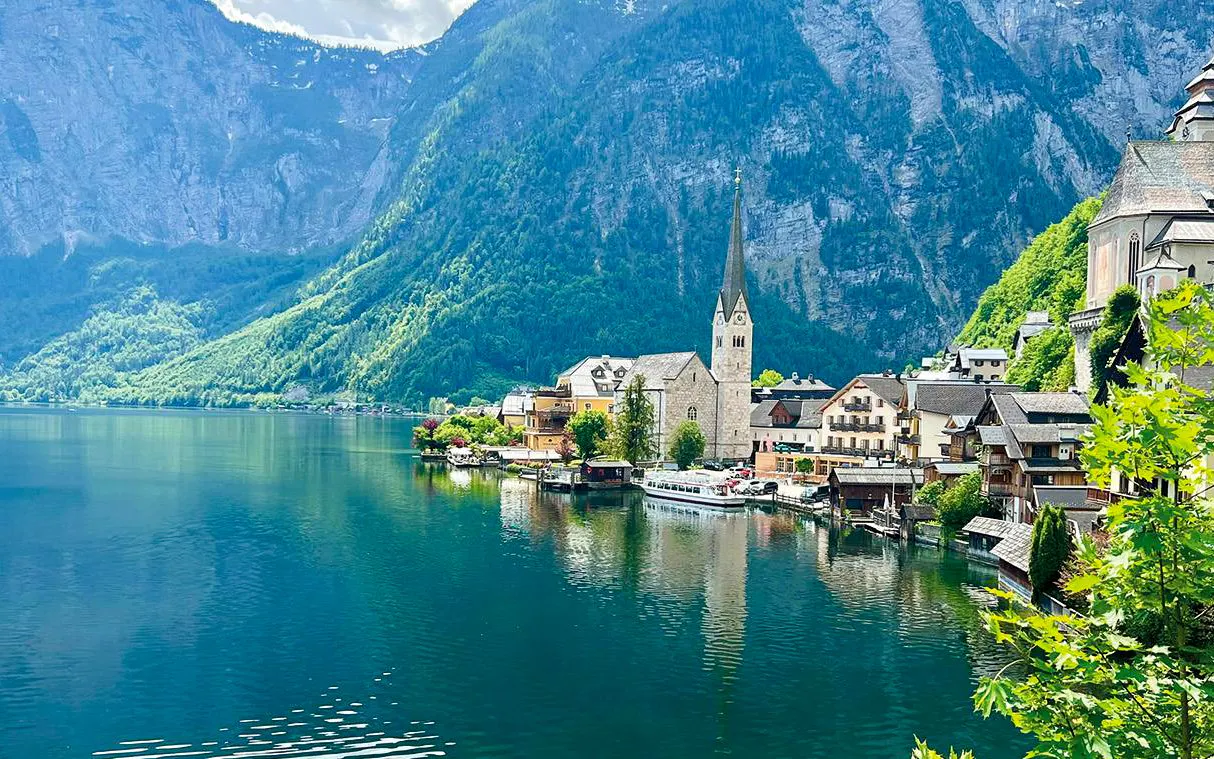Hallstatt village by the lake with mountains, seen on a day trip from Vienna.
