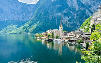 Hallstatt village by the lake with mountains, seen on a day trip from Vienna.