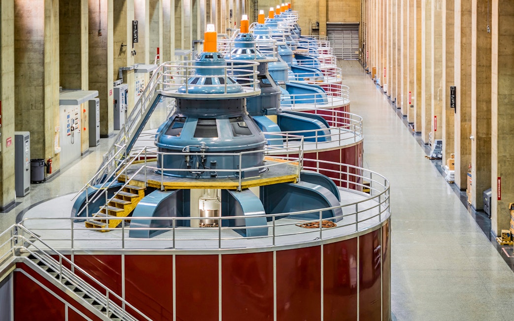 Hoover Dam turbine generators inside the power plant during exploration tour.