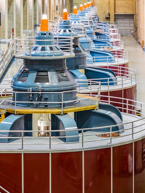 Hoover Dam turbine generators inside the power plant during exploration tour.