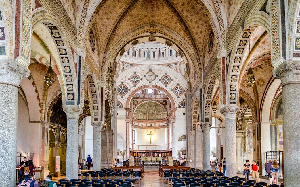 Interior of Church Santa Maria delle Grazie, Milan, showing ornate arches and altar.