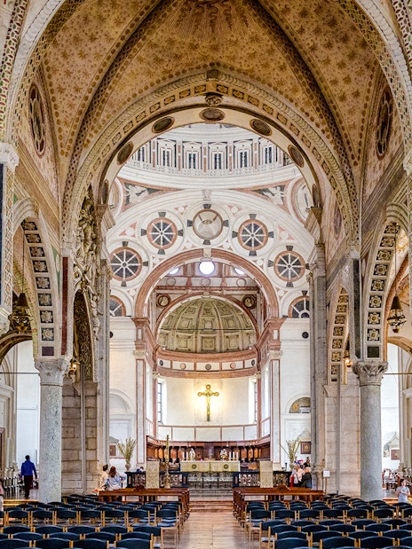 Interior of Church Santa Maria delle Grazie, Milan, showing ornate arches and altar.