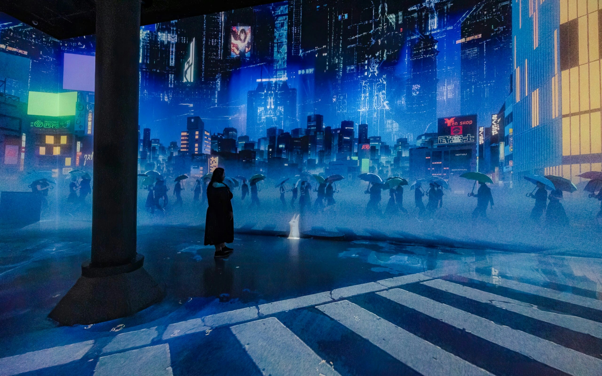 Digital cityscape with people holding umbrellas at ARTECHOUSE New York.
