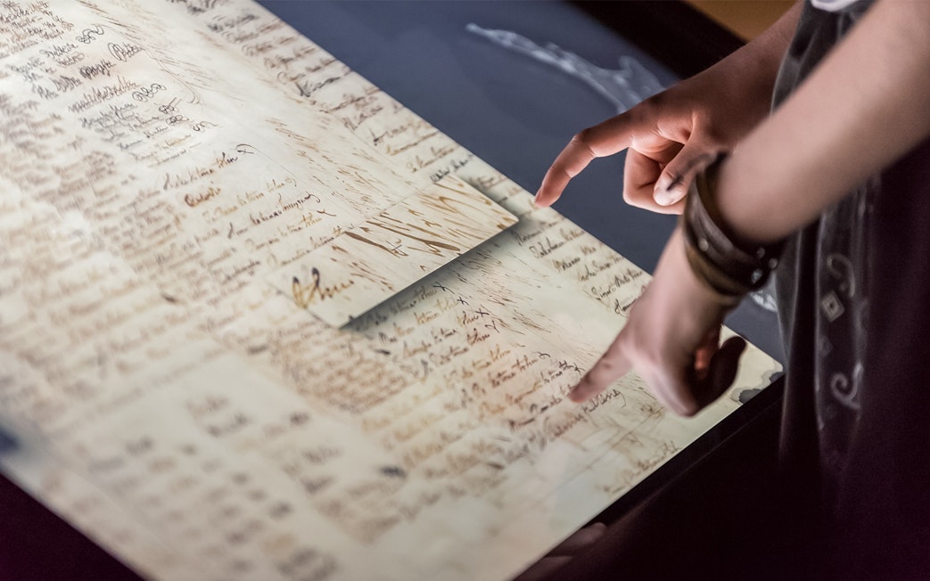 Interactive display of signatures at Museum of Waitangi exhibit.