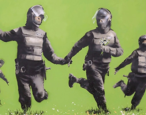Banksy's "Battle of the Beanfield" artwork displayed at Moco Museum, Amsterdam.