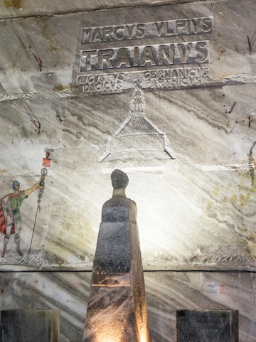 Statue of Trajan in Slanic Salt Mine, Romania, with ancient Roman inscriptions.