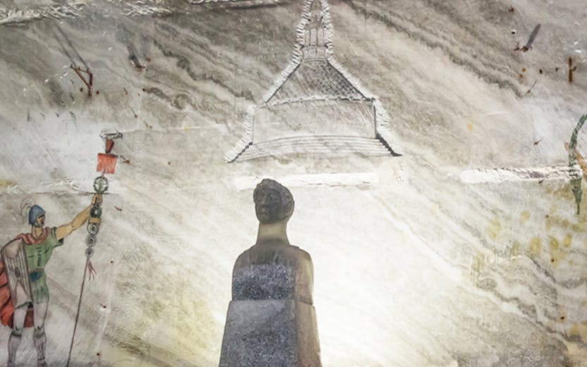 Statue of Trajan in Slanic Salt Mine, Romania, with ancient Roman inscriptions.