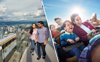 Couple enjoying city view from KL Tower observation deck, Kuala Lumpur.