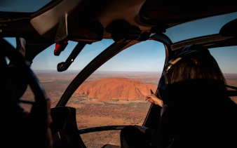 Helicopter view of Uluru in Australia during a scenic flight.