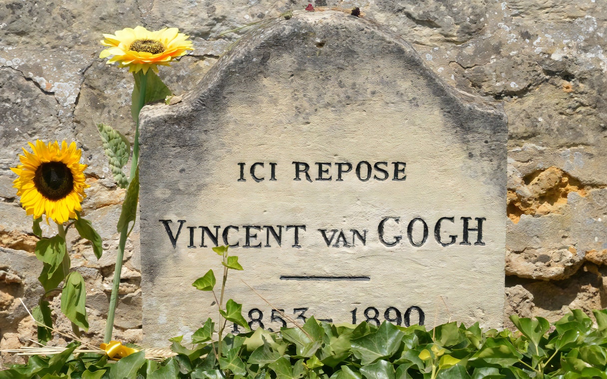 Vincent van Gogh's grave with sunflowers in Giverny, France.