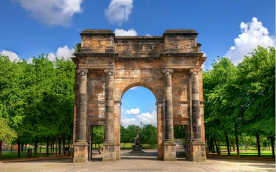 Historic McLennan Arch in Glasgow Green, part of the self-guided city exploration game.