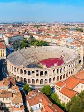 Verona Arena aerial view with surrounding cityscape in Italy.