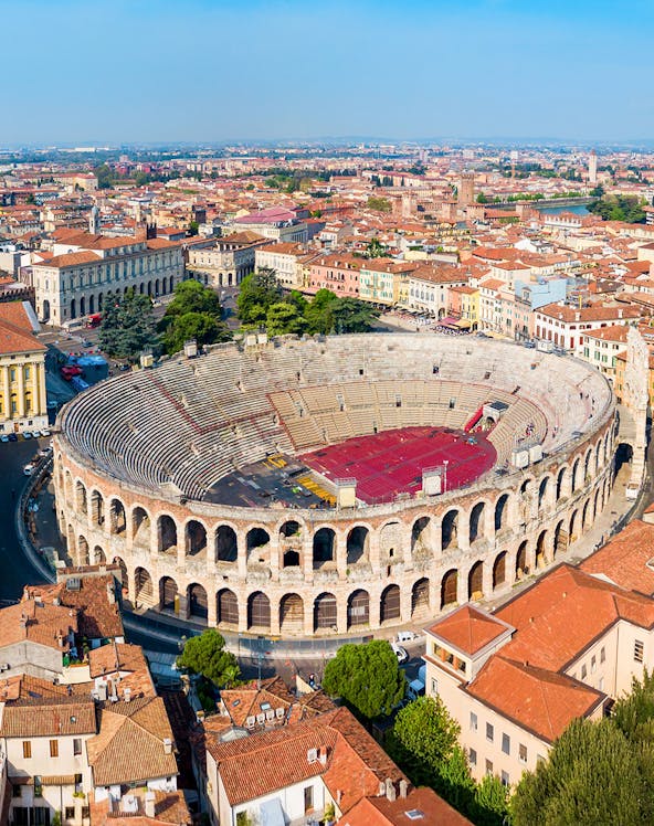 Verona Arena aerial view with surrounding cityscape in Italy.