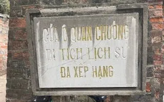 Cua O Quan Chuong historical site sign in Hanoi Old Quarter.