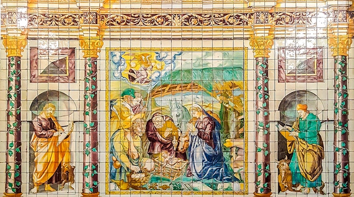 Ceramic tile mural depicting religious scene at National Tile Museum, Lisbon.