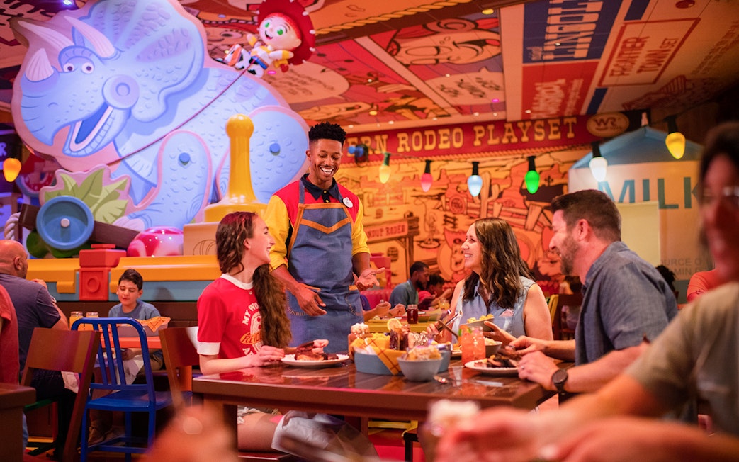 Guests dining at Toy Story-themed restaurant in Walt Disney World Resort, Orlando.