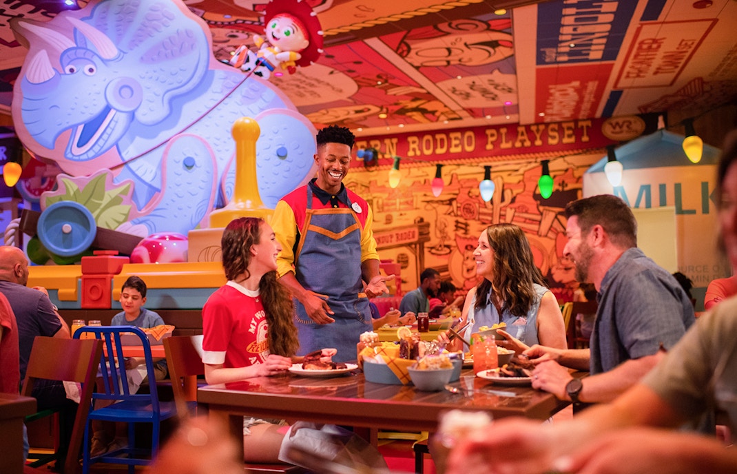 Guests dining at Toy Story-themed restaurant in Walt Disney World Resort, Orlando.