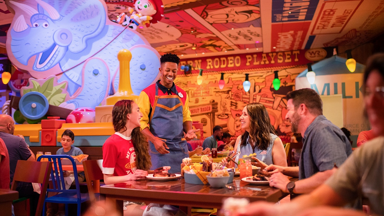 Guests dining at Toy Story-themed restaurant in Walt Disney World Resort, Orlando.