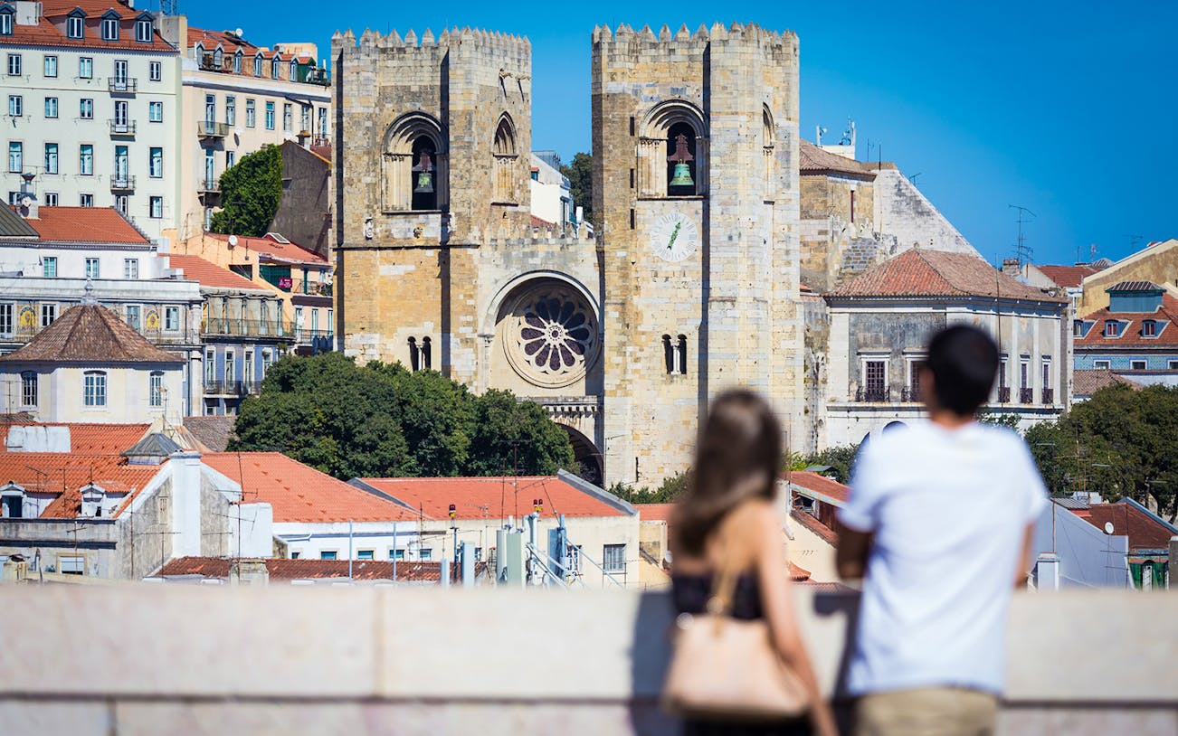 Lisbon Cathedral viewed from a distance during a guided walking tour.