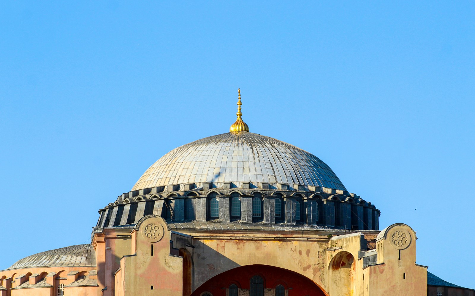 Hagia Sophia dome with intricate brick, mortar, and stone design in Istanbul, Turkey.