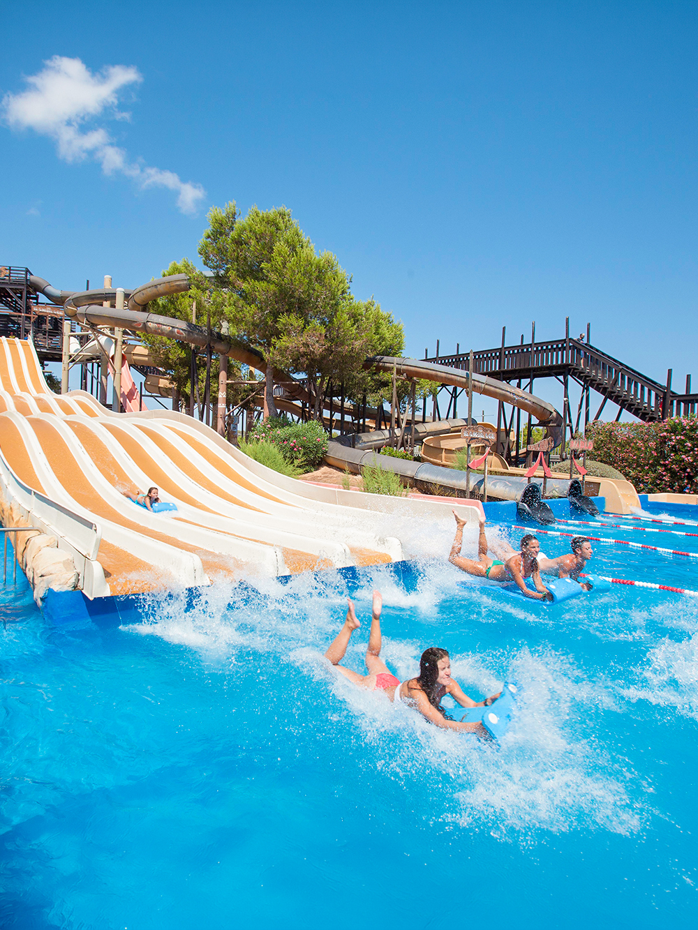 Visitors enjoying water slides at Western Water Park, Mallorca.