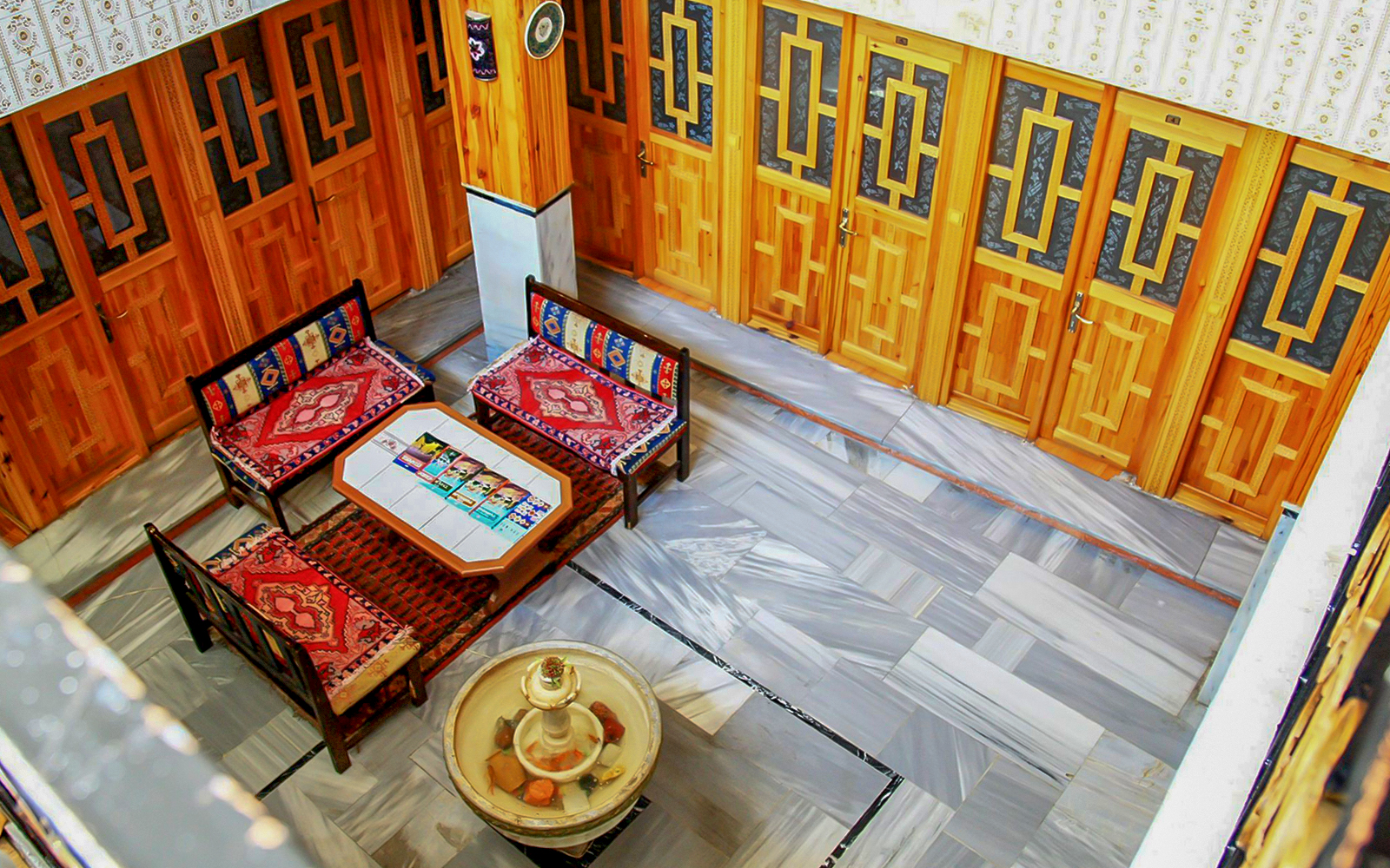 Interior seating area with traditional decor at Sifa Hamam.