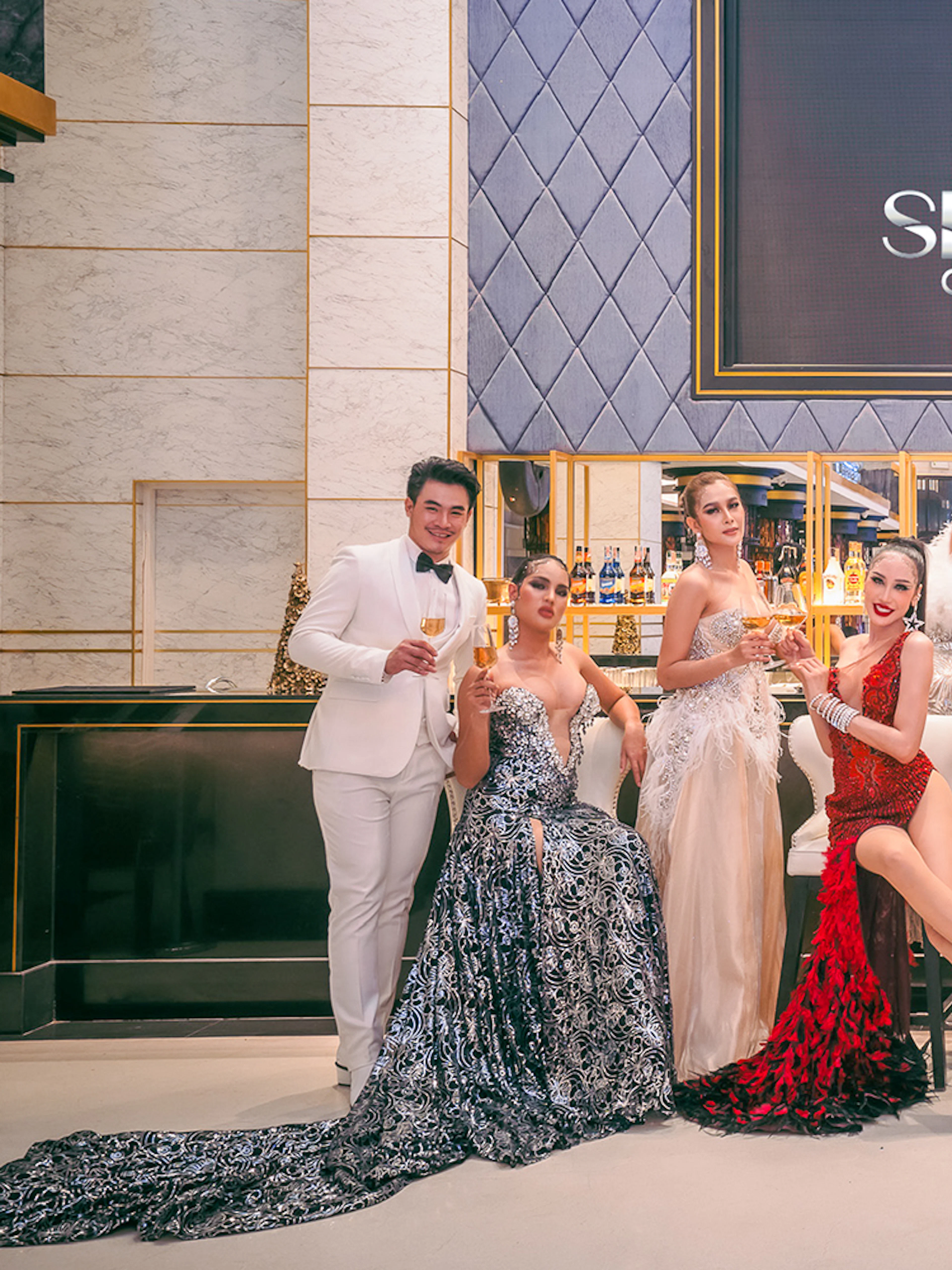 Performers in elegant costumes at Simon Cabaret Show, Phuket.