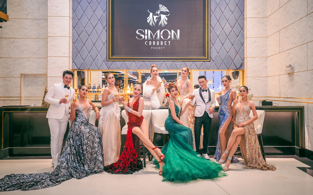 Performers in elegant costumes at Simon Cabaret Show, Phuket.