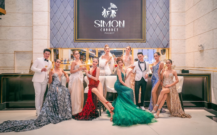 Performers in elegant costumes at Simon Cabaret Show, Phuket.