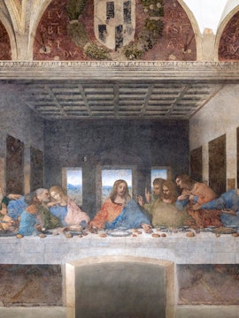 Leonardo da Vinci's Last Supper mural in Milan, Italy, depicting Jesus and disciples.