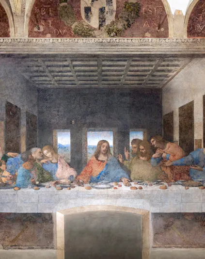 Leonardo da Vinci's Last Supper mural in Milan, Italy, depicting Jesus and disciples.