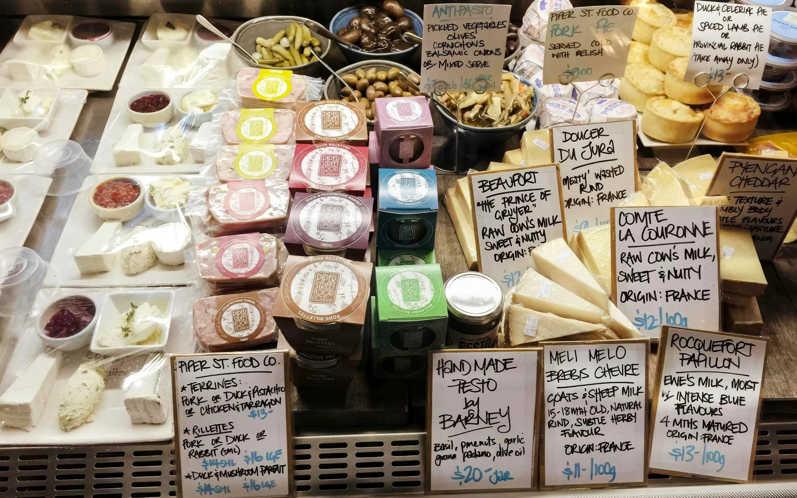 Cheese and charcuterie selection at Yarra Valley winery tour, featuring local and French varieties.