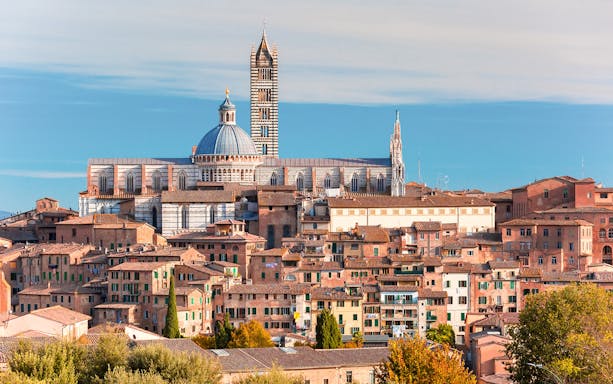 Siena Cathedral and historic buildings in Siena, Italy, part of Pisa, Siena, San Gimignano & Chianti tour.