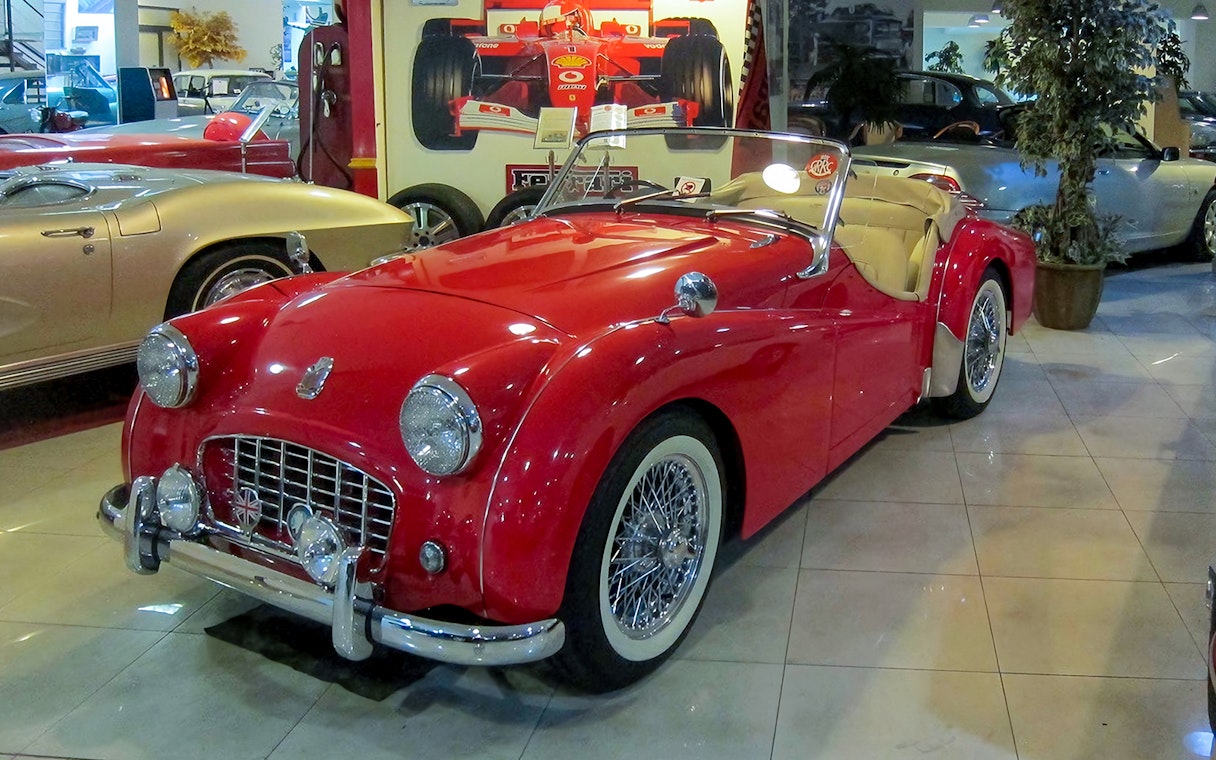 Red vintage convertible car at Malta Classic Car Collection Museum.