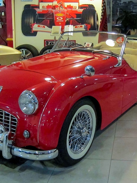 Red vintage convertible car at Malta Classic Car Collection Museum.