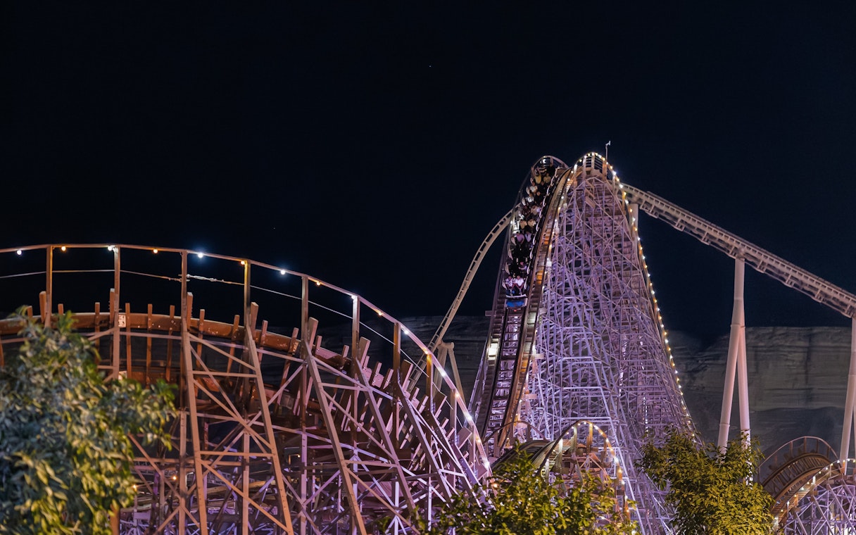 Roller coaster at night in Six Flags Qiddiya City, Saudi Arabia.