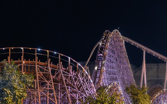 Roller coaster at night in Six Flags Qiddiya City, Saudi Arabia.