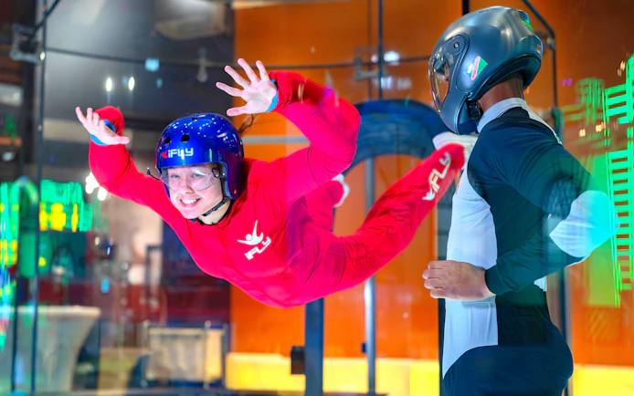Indoor skydiving experience at iFLY with instructor guidance.