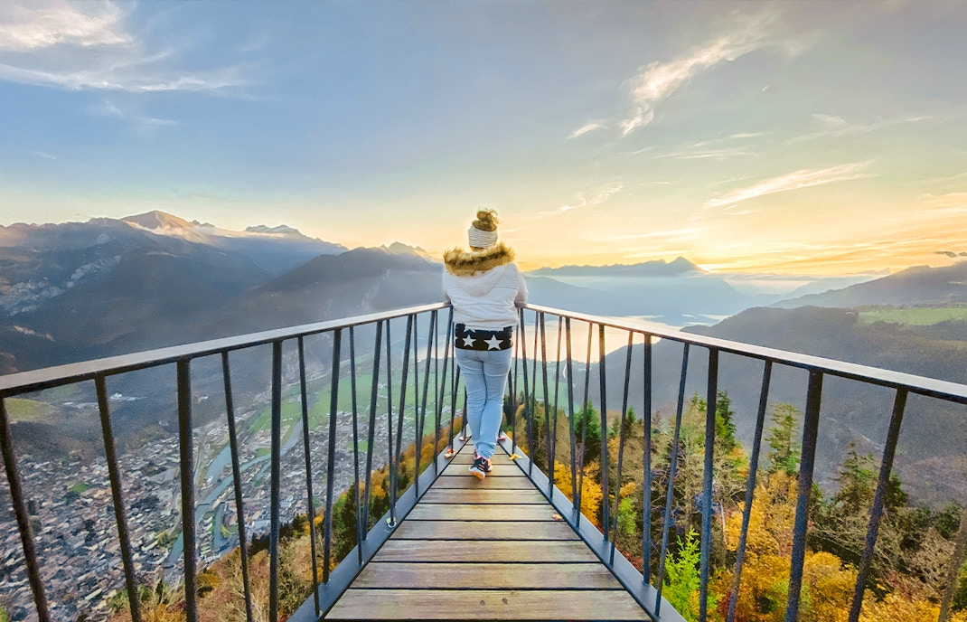 Woman enjoying the view from Harder Kulm