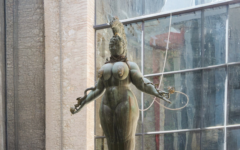 Statue of goddess Diana atop "Rainy Taxi" at Dalí Theatre-Museum, Figueres, Spain.