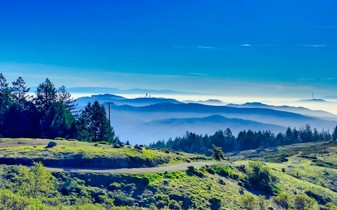 Rolling hills and distant mountains in Marin County, California.