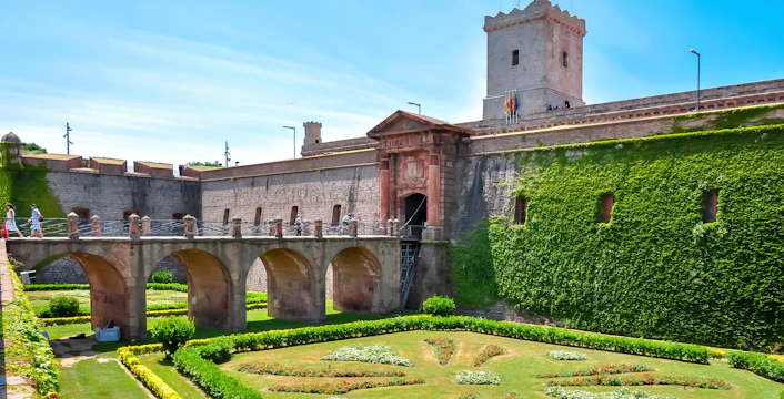 Fortress of Montjuic with stone bridge and gardens, Barcelona, Spain.