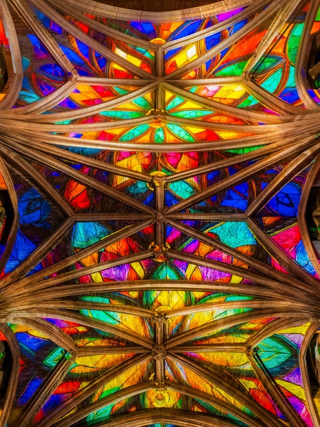 Stained glass ceiling of Manchester Cathedral during LUMINISCENCE 360° Immersive Show.