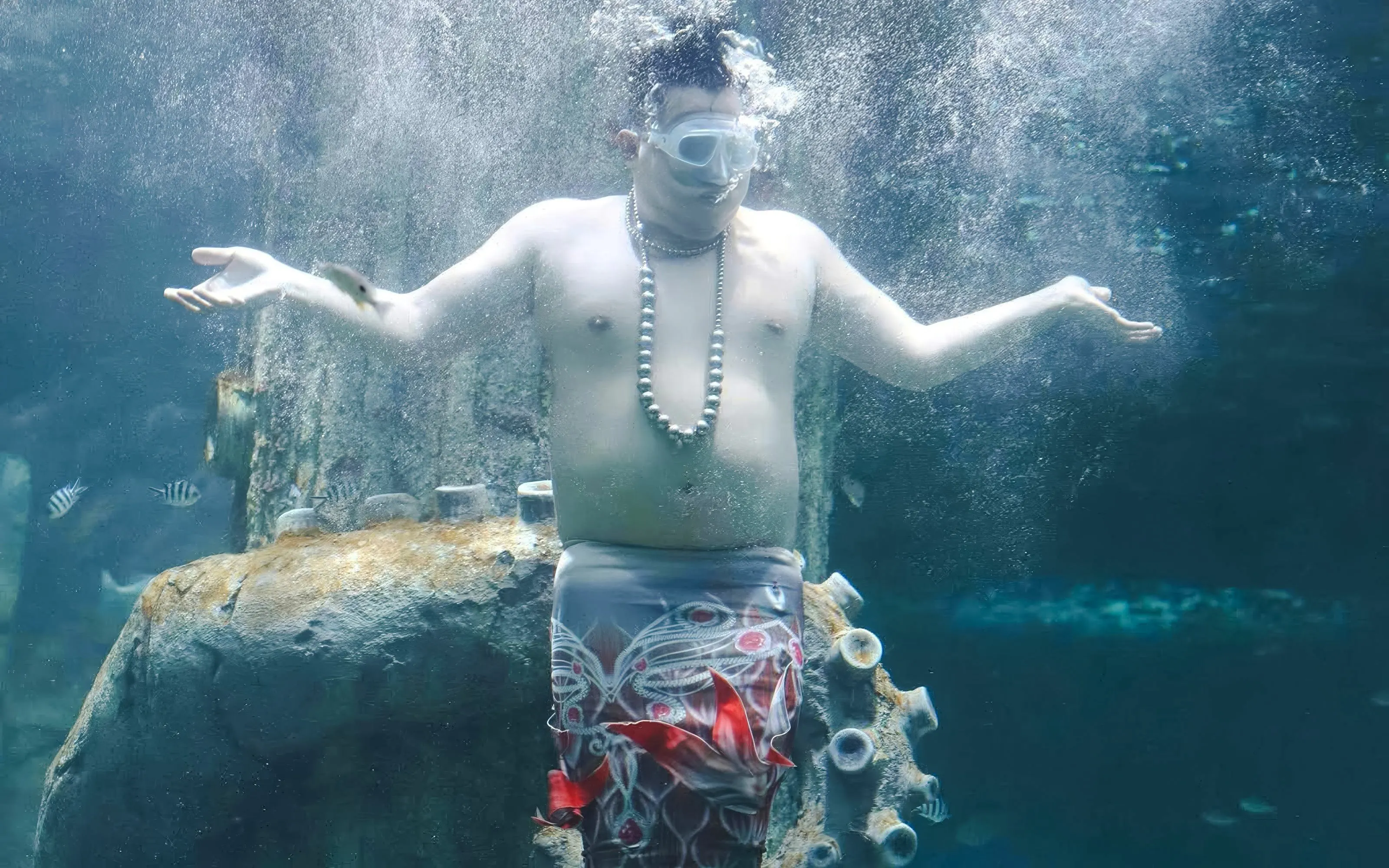 Performer underwater at Vinwonders Phu Quoc Theme Park Mermaid show.