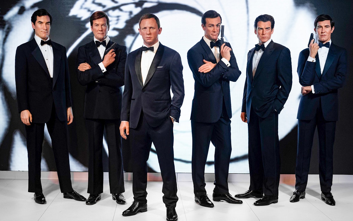 Wax figures of James Bond actors at Madame Tussauds London, part of the London City Pass attractions.